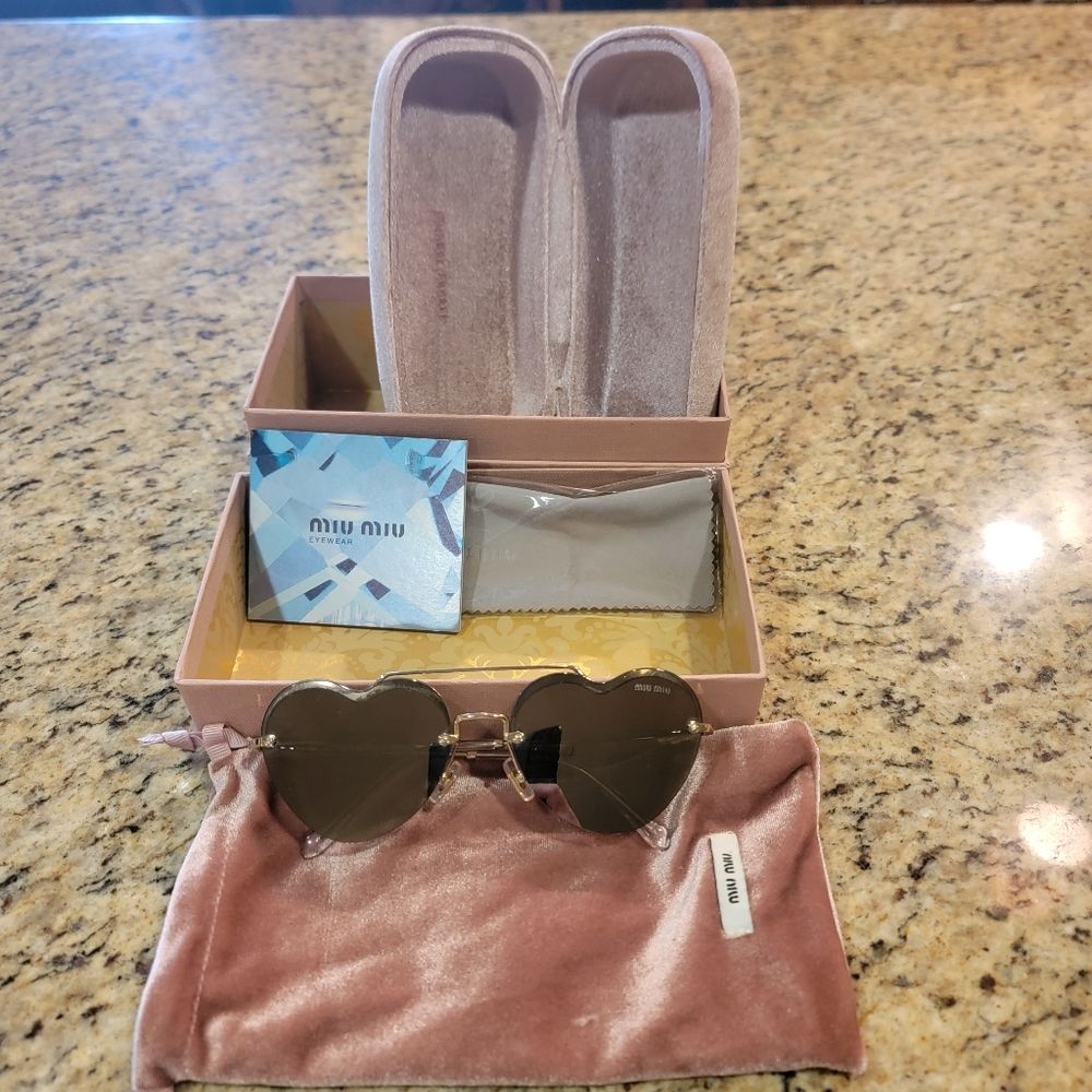 Miu Miu heart shaped gray framed sunglasses